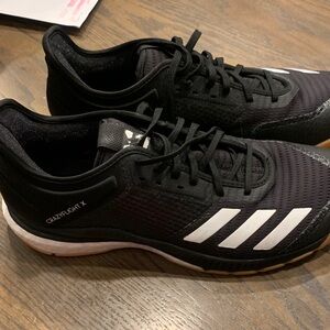 Adidas women’s Black and White Athletic Shoes